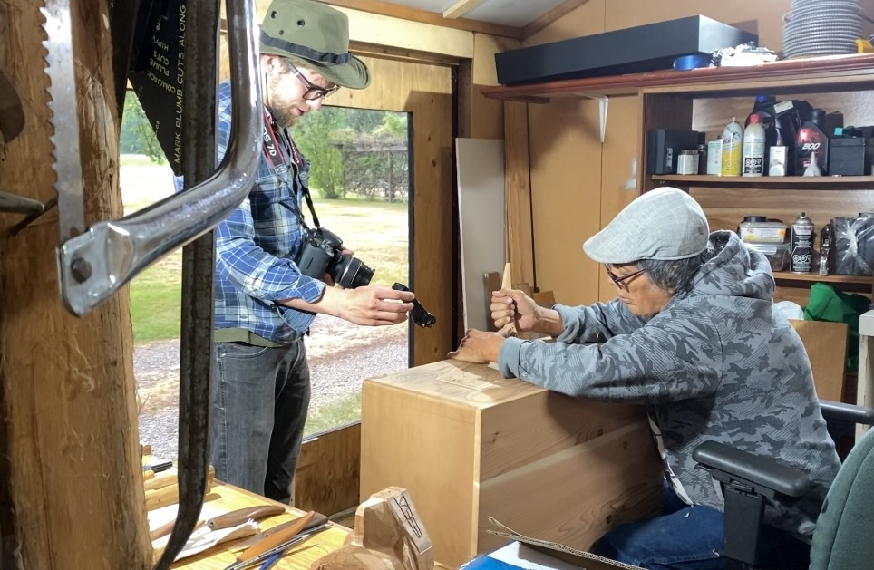 Jesse James Boyes filming Charles Joseph carving